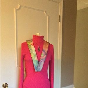 Pink ribbed turtleneck sweater